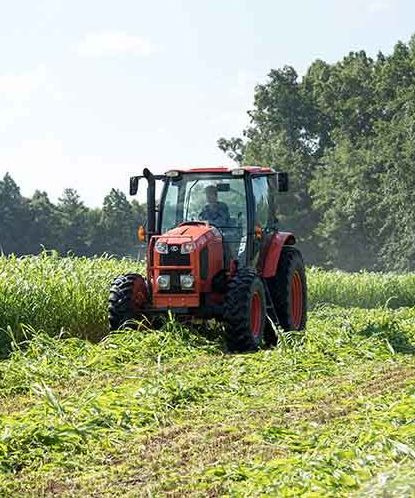 Farmer driving a tractor